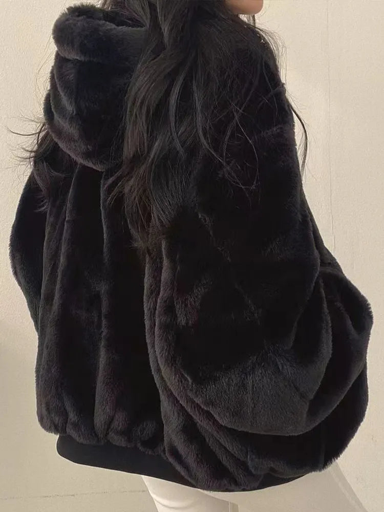 Women's oversized fleece lined jacket in black – fleece side