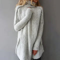 Women's oversized turtleneck knit sweater in light grey – front view