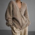 Women's oversized v-neck cardigan in brown – front view