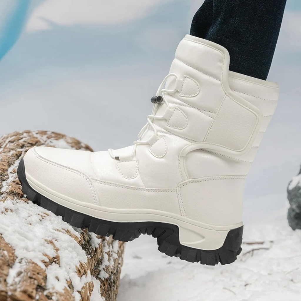 Women's toggle lace winter boots in cream – in the snow