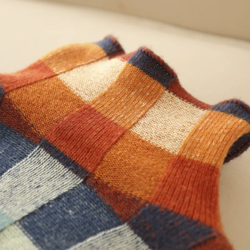 Close-up of the orange and blue check pattern
