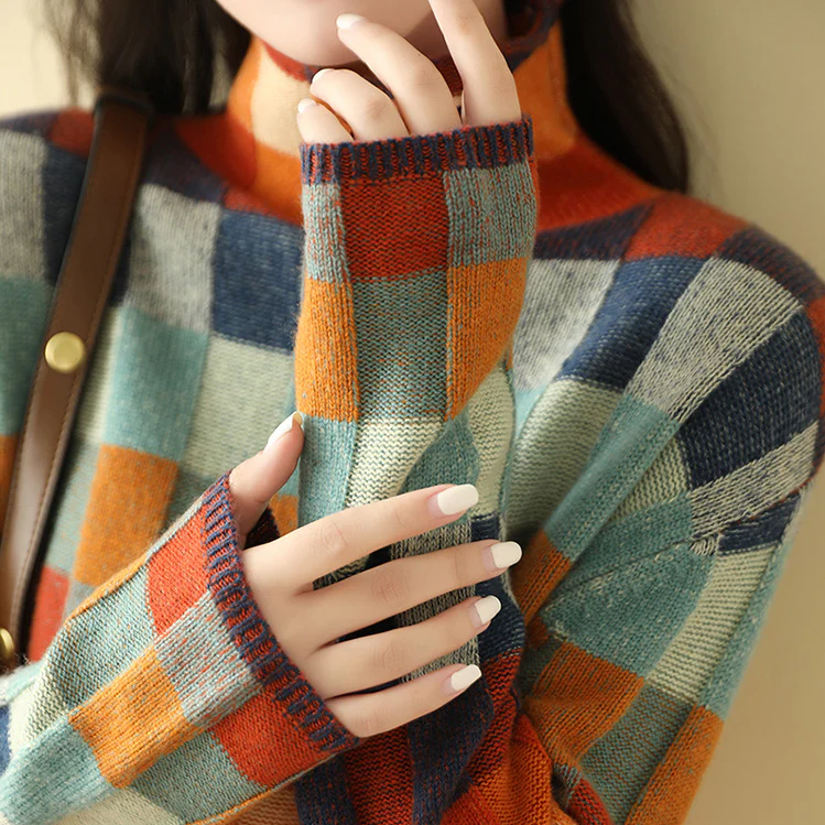 Ribbed cuff detail of the women's patchwork check knit sweater