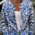 Women's patterned knit cardigan with blue floral print – front view