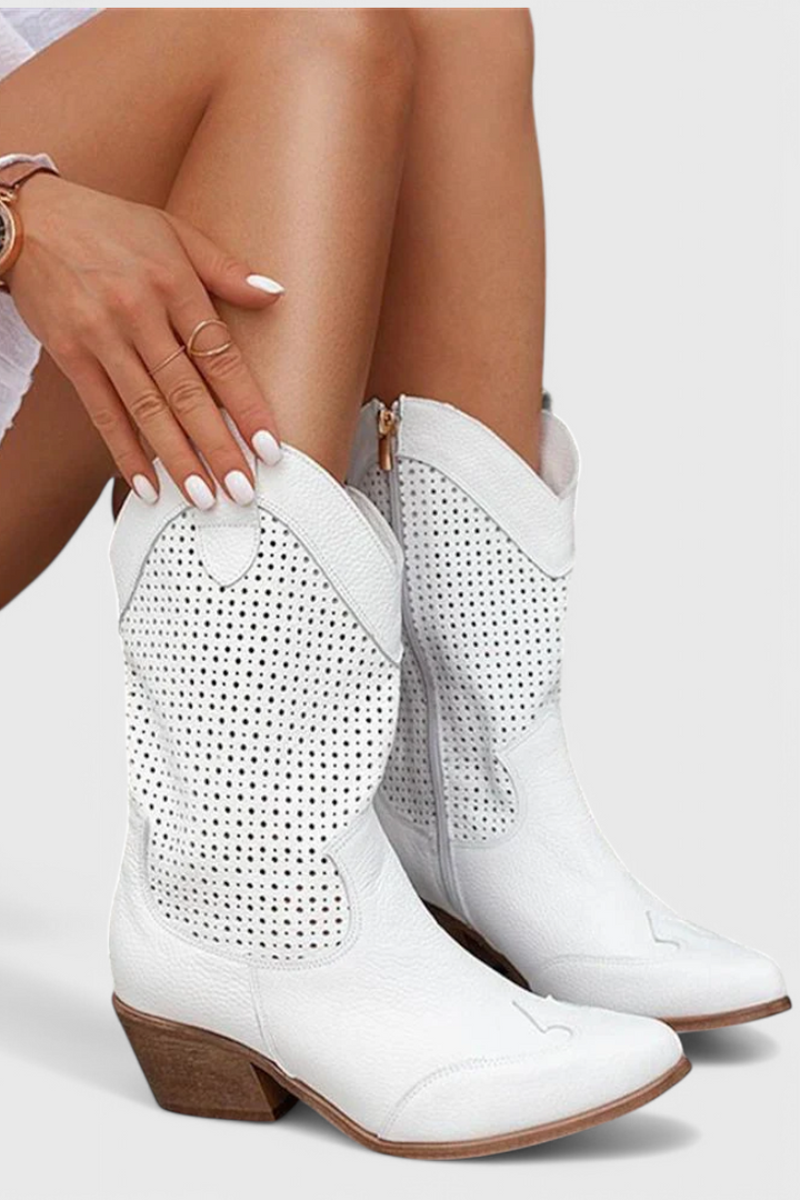 Women's perforated western boots in white – seated