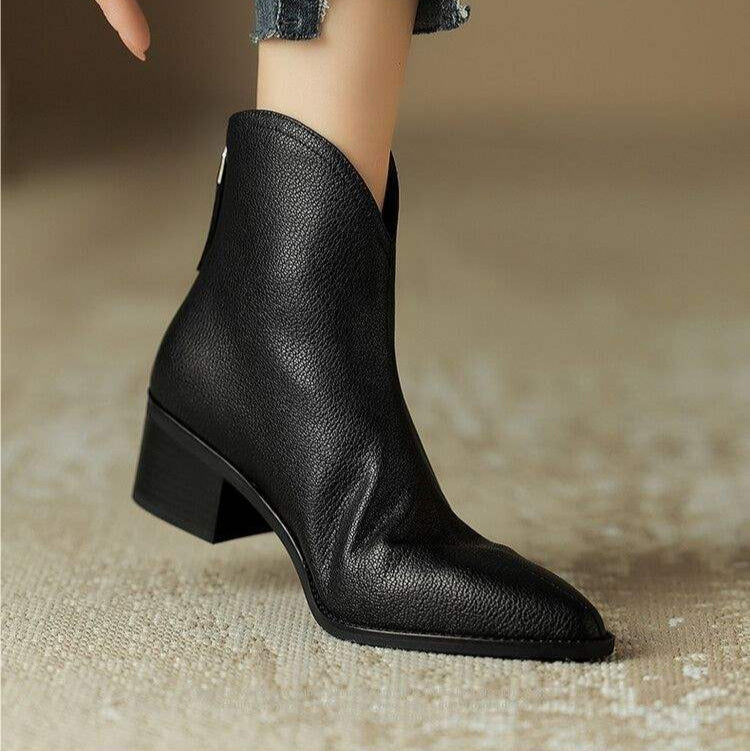 Women's pointed low heel ankle boots in black – front view