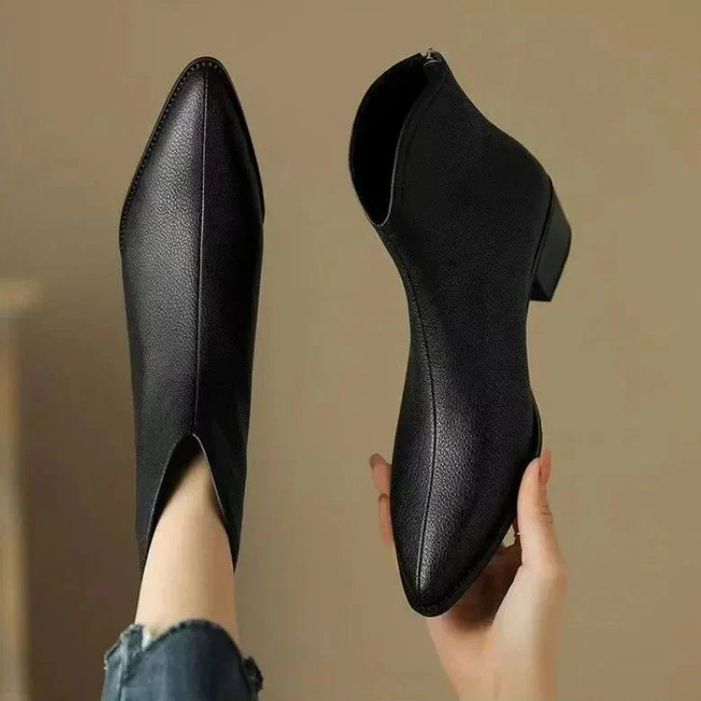 Women's pointed low heel ankle boots in black – top view