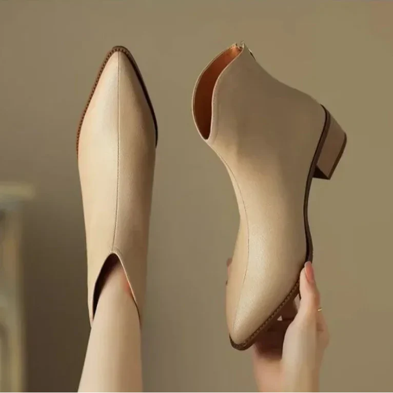 Women's pointed low heel ankle boots in beige – top view