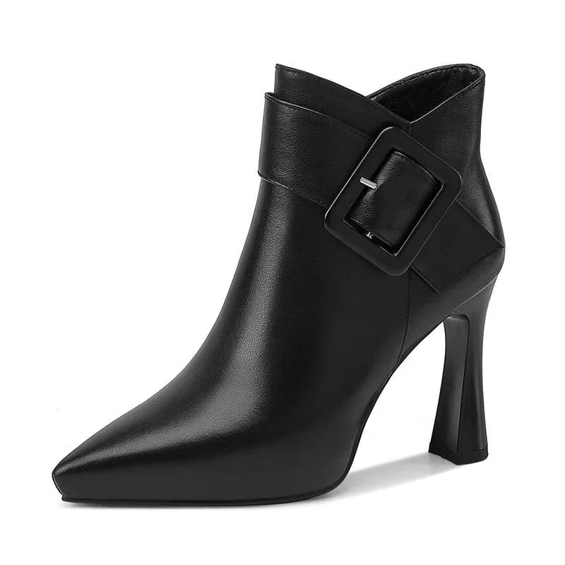 Women's pointed buckle heeled boots in black – product view