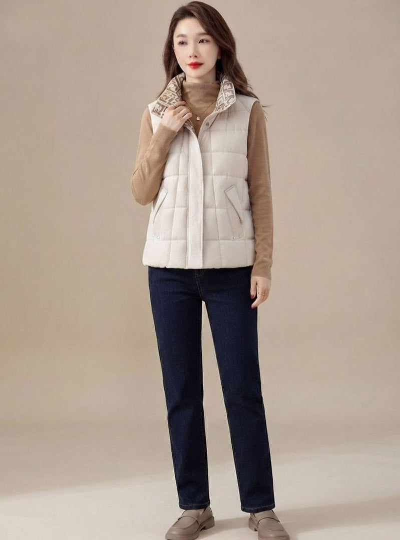 Women's high collar quilted gilet in cream – front view