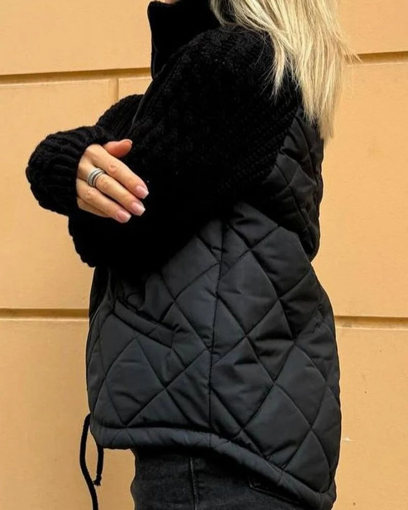 Women's knit sleeve quilted jacket in black – side view