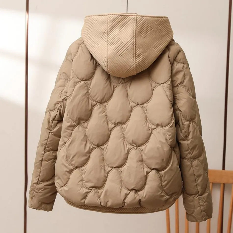 Women's quilted hooded puffer jacket in brown – back view
