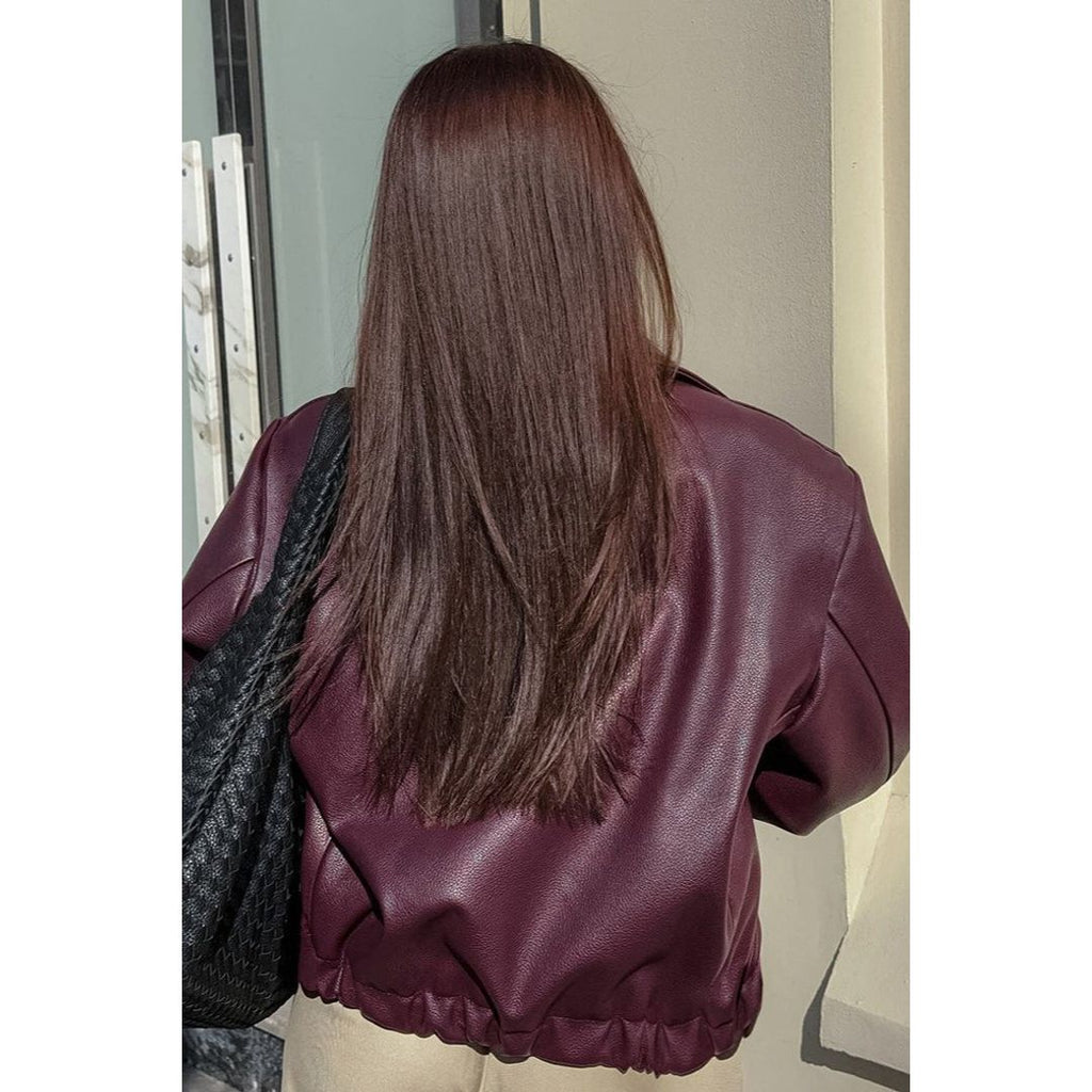 Women's relaxed leather look jacket in burgundy, back view