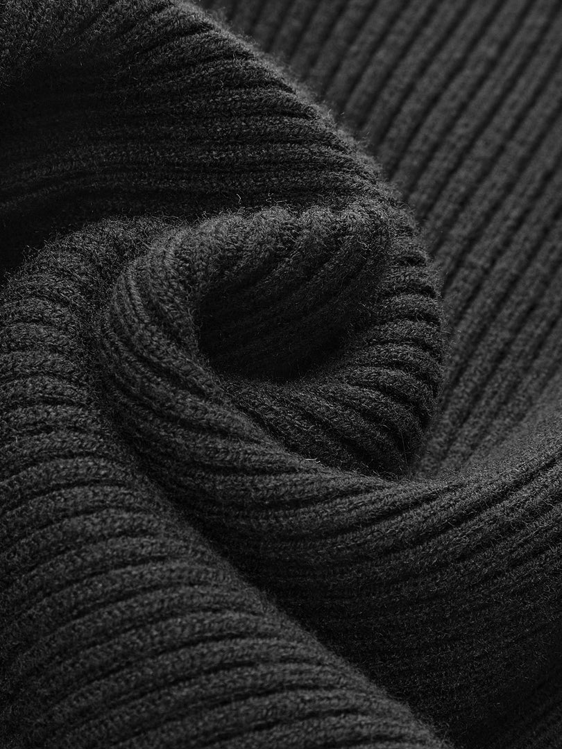 Close-up of the ribbed knit on the black turtleneck top