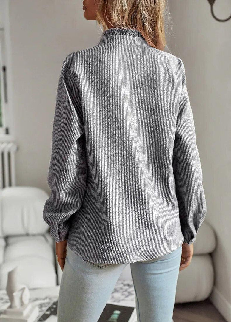 Women's ruffle trim blouse in grey – back view