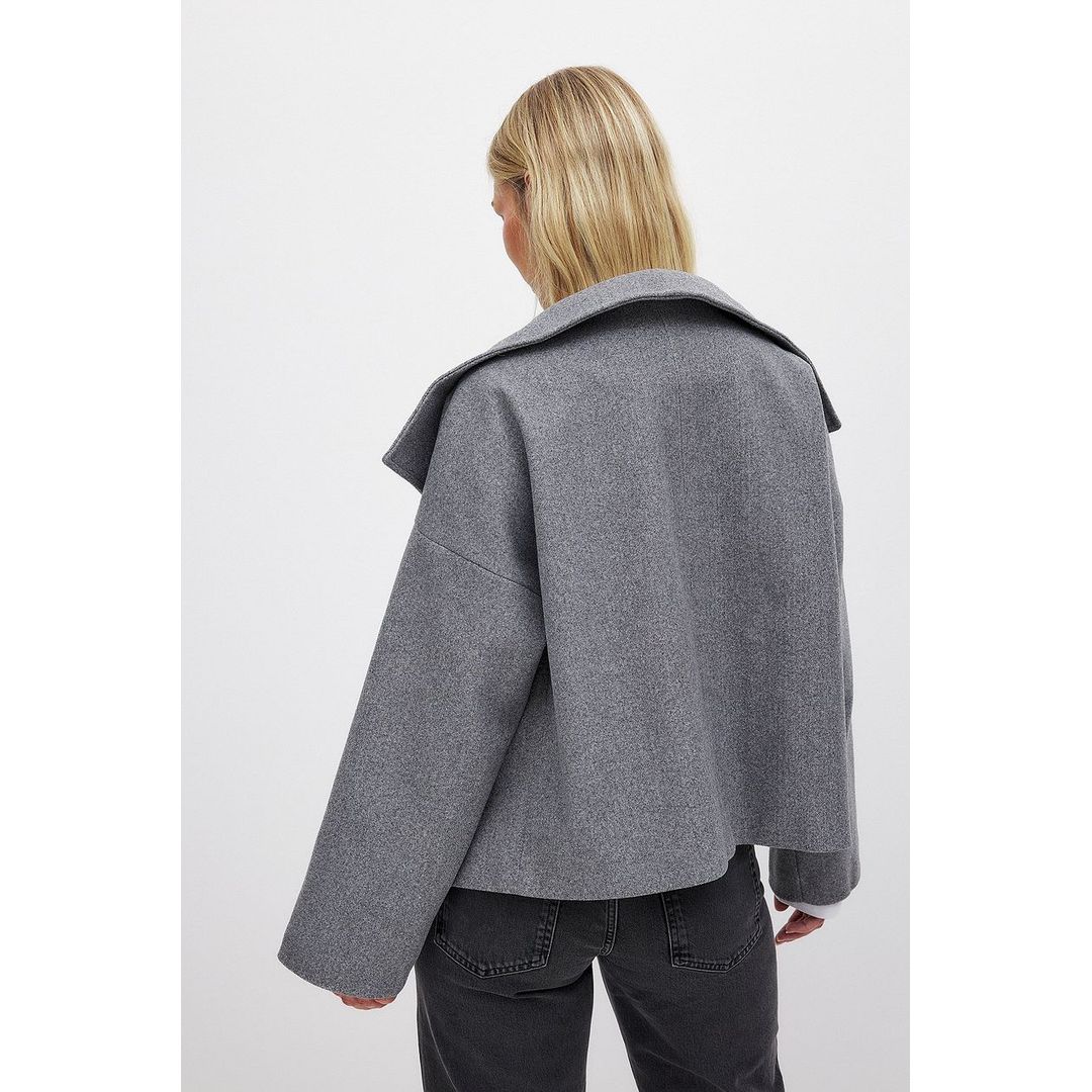 Women's short double-breasted coat with wide collar in grey, back view