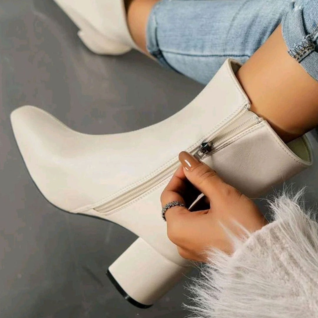 Women's sleek block heel ankle boots in cream – side zip