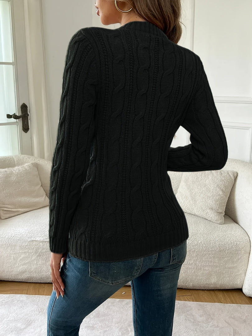 Women's slim cable knit sweater in black – back view