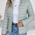 Women's slim fit quilted jacket in sage green – front view