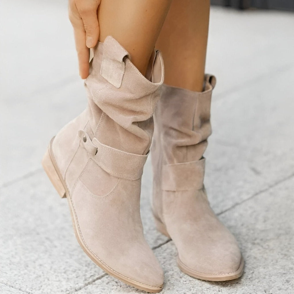 Women's slouch buckle boots in beige – worn
