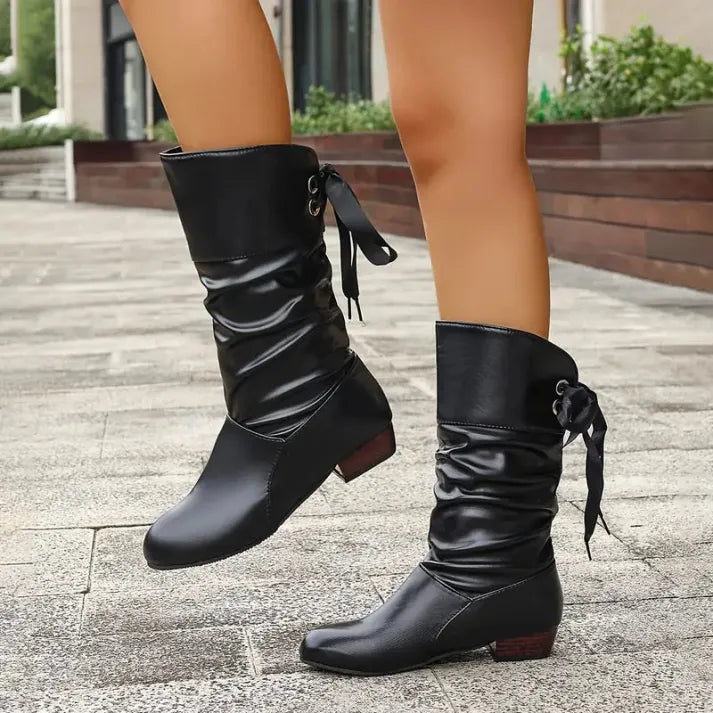 Women's slouch mid-calf boots in black – front view