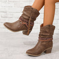 Women's braided strap slouchy boots in brown – side view