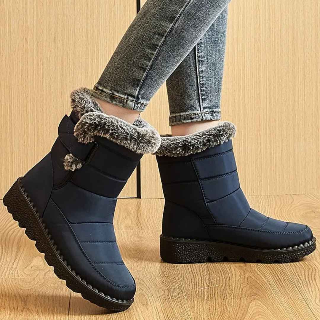 Women's faux fur cuff snow boots in navy – walking