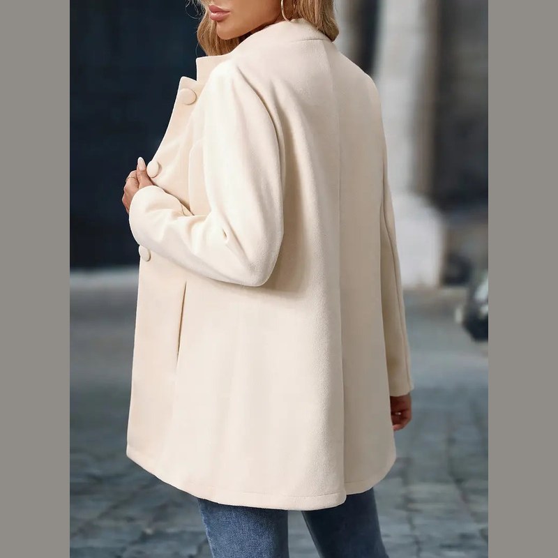 Women's stand collar coat in cream – back view
