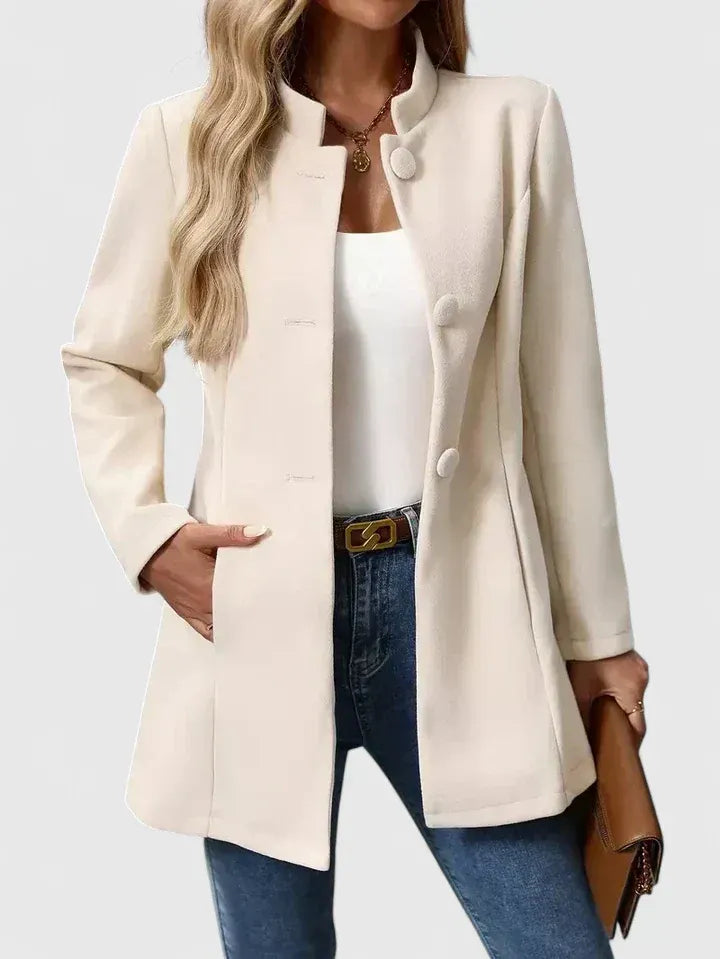 Women's fitted stand collar coat in apricot – worn open