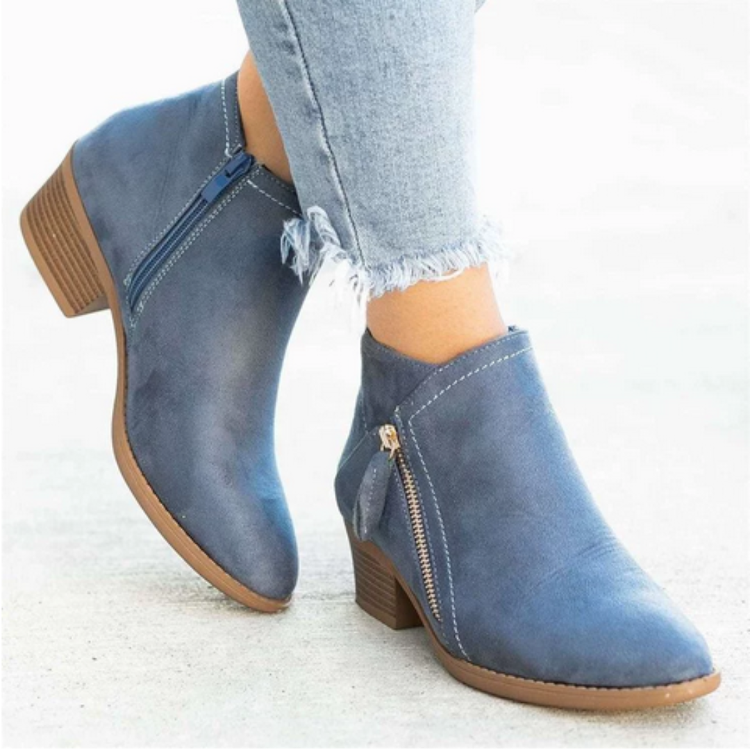 Women's side zip ankle boots in blue – worn