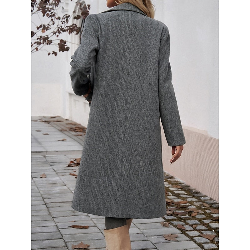 Women's tailored longline coat with lapels in dark grey – side look