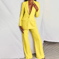 Women's two-piece trouser suit with tailored blazer in yellow – worn look
