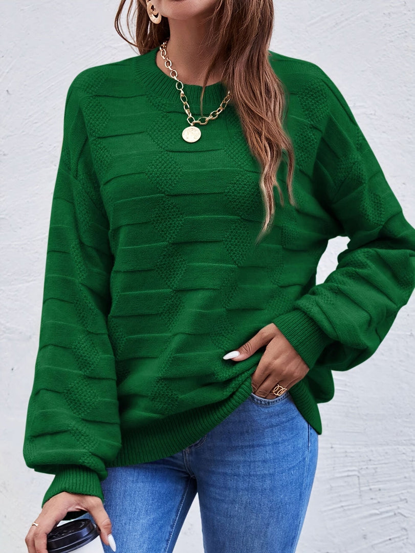 Women's textured round neck sweater in green – hand in pocket