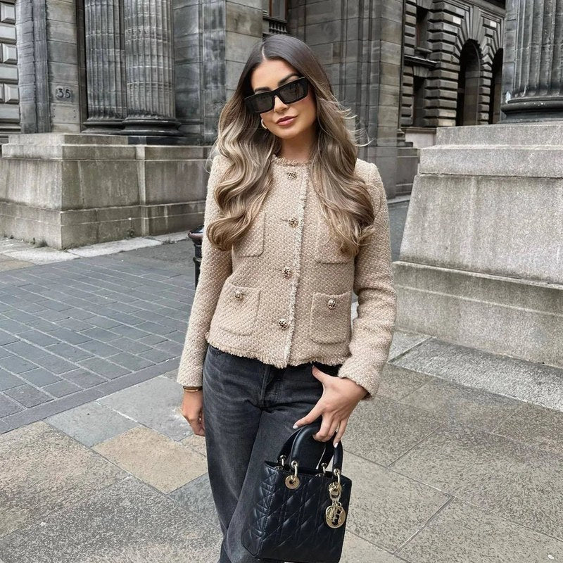 Women's tweed look jacket in beige – front view with black jeans