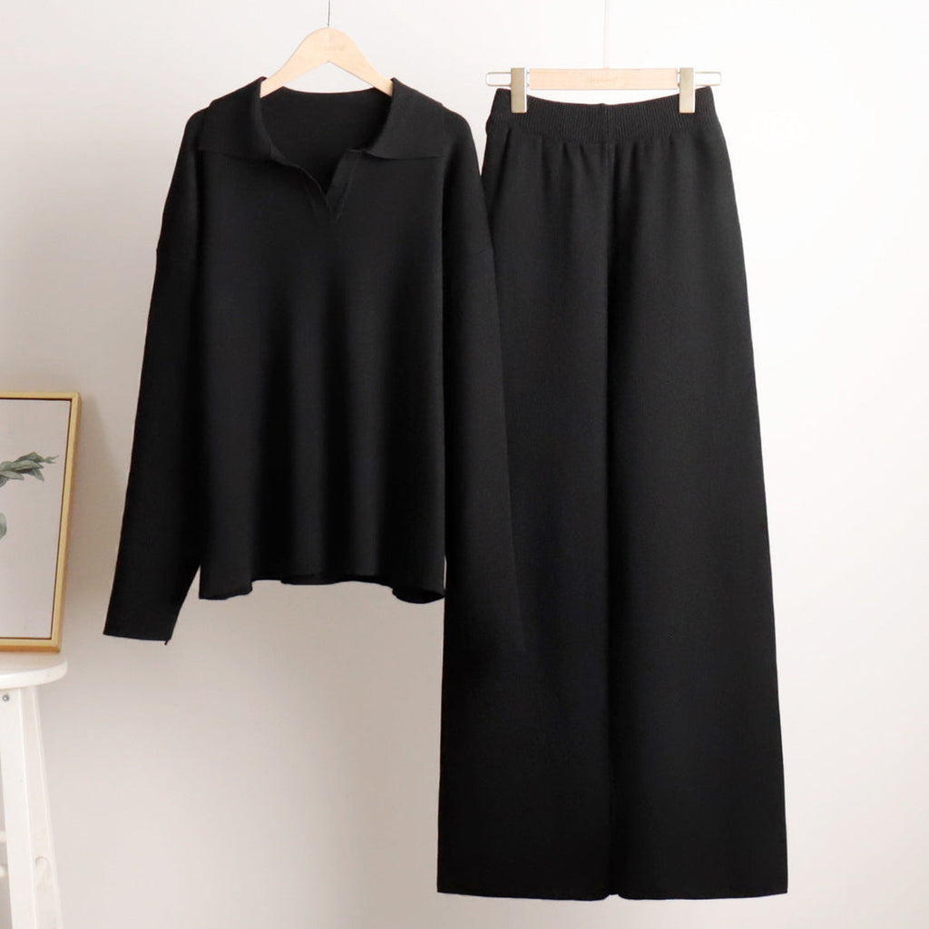 Women's polo sweater and wide-leg trouser set in black – on a hanger