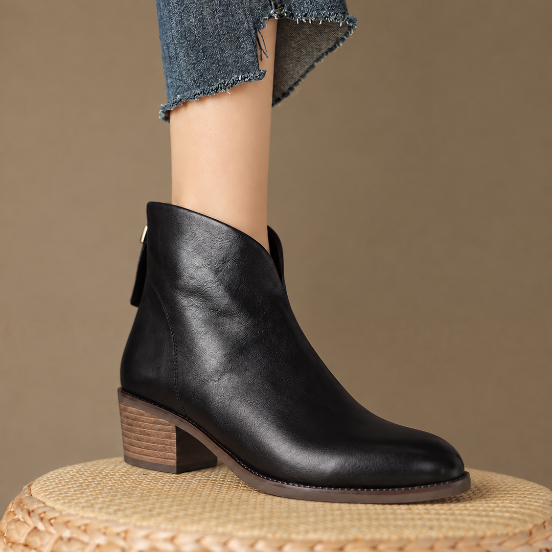 Women's V-cut ankle boots in black – side view