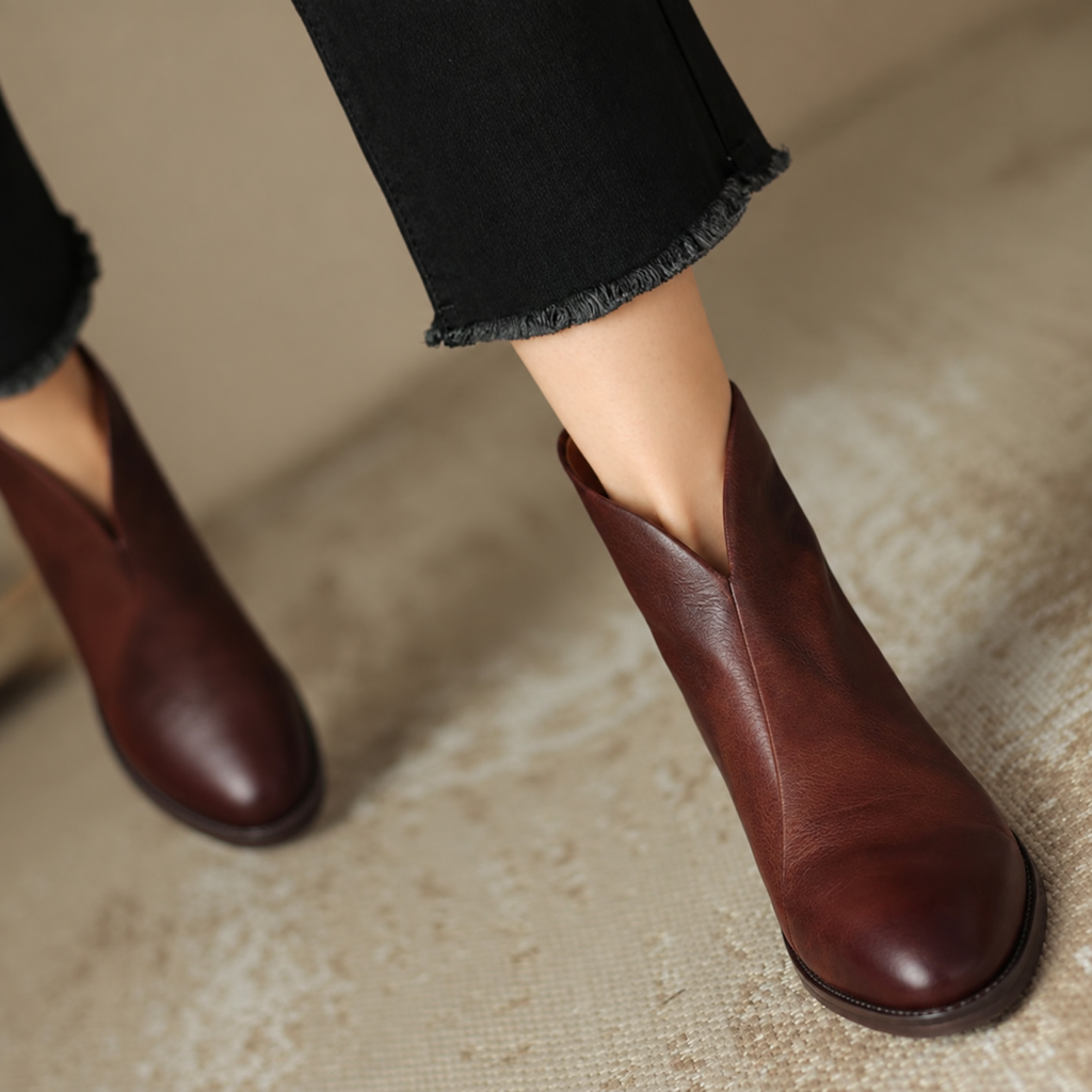 Women's V-cut ankle boots in brown – worn