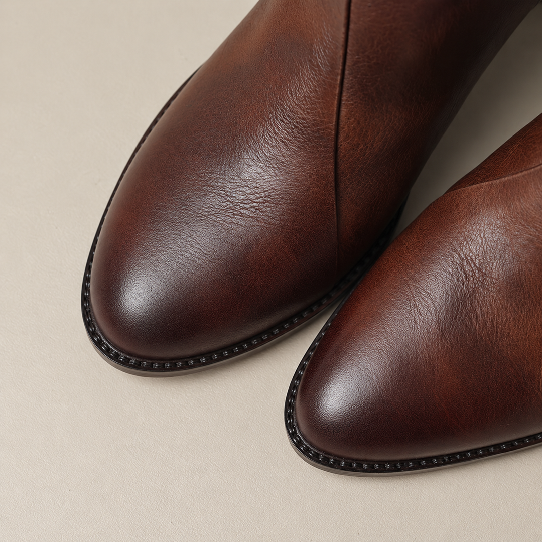 Close-up of the toe on the brown V-cut ankle boots