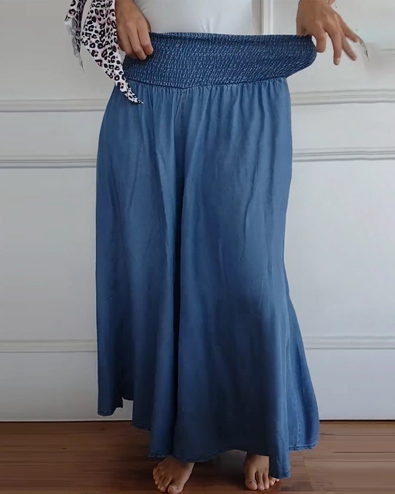 Women's smocked waist wide leg trousers in blue – waist view